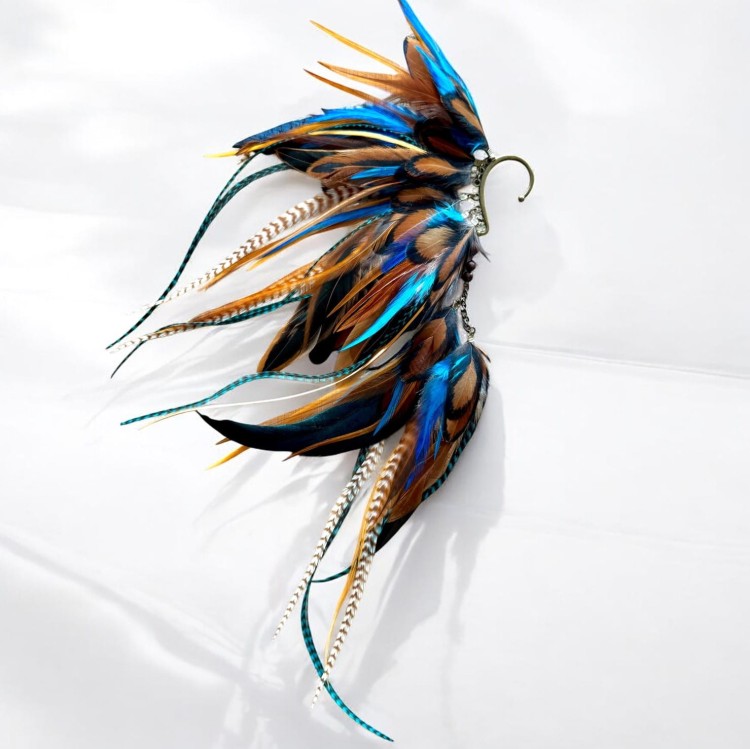 Kobalrtowe skrzydła - nausznica z piór Zuzzo